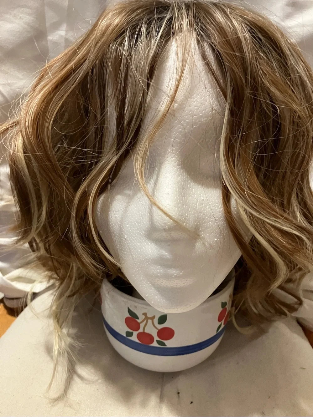 New.  Multi color ( at least 5 different shades ) shaggy n free style wig